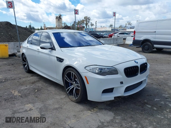 2013 BMW M5 with VIN WBSFV9C56DC772961, listed as a IAAI auction lot 41765457 with 104,568 mi miles. Bid and sale history available at carsss.com. Image 1.