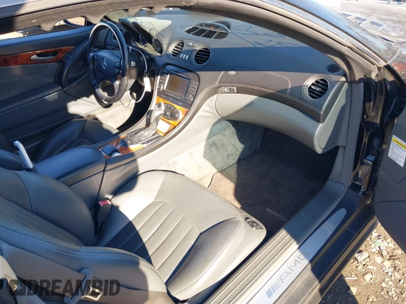 2005 Mercedes-Benz SL 55 AMG with VIN WDBSK74F75F099722, listed as a IAAI auction lot 41308261 with 60,134 mi miles and . Bid and sale history available at DreamBid. Image 5.