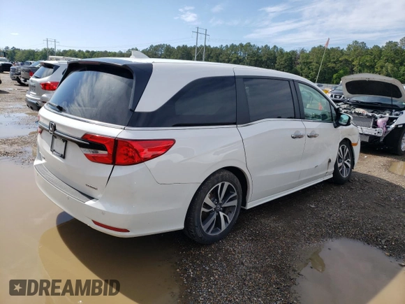 2024 Honda Odyssey Touring with VIN 5FNRL6H84RB024909, listed as a Copart auction lot 56226255 with 11,094 mi miles and Salvage title. Bid and sale history available at DreamBid. Image 3.