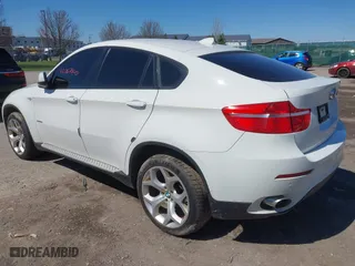 2011 BMW X6 35i with VIN 5UXFG2C58BLX07890, listed as a IAAI auction lot 42067800 with 144,367 mi miles. Bid and sale history available at carsss.com. Image 3.