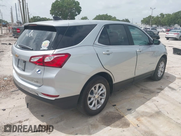 2021 Chevrolet Equinox LT z VIN 3GNAXKEV0MS165682, wystawiony jako IAAI lot #42419436 z przebiegiem 42 199 mil mil oraz . Historia ofert i sprzedaży dostępna na DreamBid. Obrazek 4.