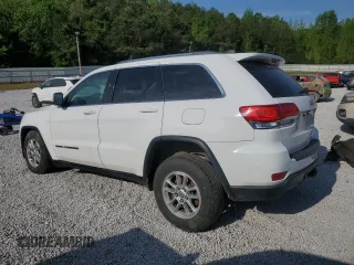 2019 Jeep Grand Cherokee Laredo E with VIN 1C4RJEAG2KC732645, listed as a Copart auction lot 53336495 with 76,221 mi miles and Salvage title. Bid and sale history available at DreamBid. Image 2.