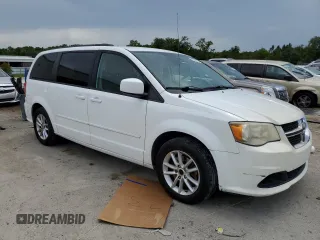 2014 Dodge Grand Caravan SXT z VIN 2C4RDGCG7ER214087, wystawiony jako Copart lot #61096815 z przebiegiem 131 241 mil mil oraz Czysty tytuł • Clean title. Historia ofert i sprzedaży dostępna na DreamBid. Obrazek 4.