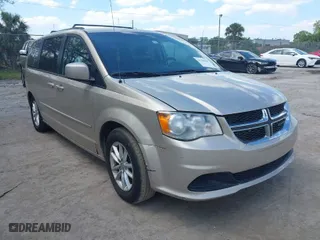 2014 Dodge Grand Caravan SXT with VIN 2C4RDGCG2ER352085, listed as a IAAI auction lot 41799305 with 163,938 mi miles. Bid and sale history available at carsss.com. Image 1.