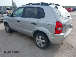 2006 Hyundai Tucson GL with VIN KM8JM12BX6U469719, listed as a IAAI auction lot 41899134 with 136,179 mi miles. Bid and sale history available at carsss.com. Image 3.