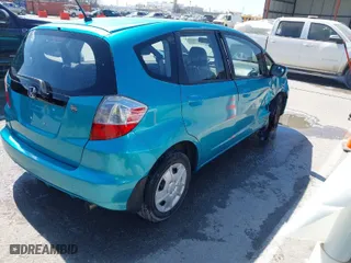 2013 Honda Fit with VIN JHMGE8H31DC061809, listed as a IAAI auction lot 41884724 with 10,713 mi miles. Bid and sale history available at carsss.com. Image 4.