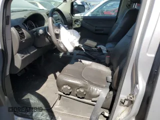 2010 Nissan Xterra S with VIN 5N1AN0NU2AC519838, listed as a Copart auction lot 57301355 with 129,990 mi miles and Salvage title. Bid and sale history available at DreamBid. Image 7.