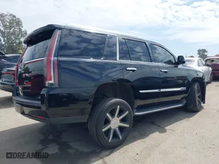 2015 Cadillac Escalade Luxury with VIN 1GYS3MKJ6FR747131, listed as a IAAI auction lot 41820427 with 49,956 mi miles. Bid and sale history available at carsss.com. Image 4.