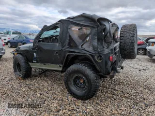 2002 Jeep Wrangler X with VIN 1J4FA39S42P747330, listed as a Copart auction lot 45536485 with 157,289 mi miles and Salvage Title. Bid and sale history available at carsss.com. Image 2.