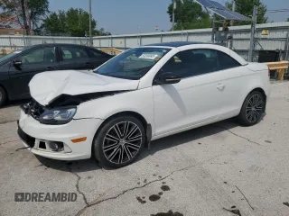 2014 Volkswagen Eos Sport with VIN WVWBW8AH9EV000213, listed as a Copart auction lot 59268995 with 59,393 mi miles and Salvage title. Bid and sale history available at DreamBid. Image 1.
