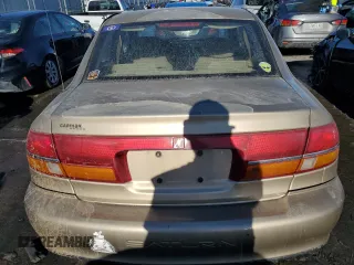 2001 Saturn LS z VIN 1G8JU52FX1Y552416, wystawiony jako Copart lot #41967165 z przebiegiem 196 403 mil mil oraz Szkody całkowita. Historia ofert i sprzedaży dostępna na DreamBid. Obrazek 6.