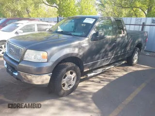 2005 Ford F-150 XLT with VIN 1FTPX14585NB56142, listed as a IAAI auction lot 42168338 with 208,074 mi miles. Bid and sale history available at carsss.com. Image 2.