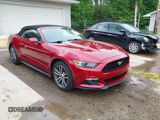 2016 Ford Mustang EcoBoost Premium z VIN 1FATP8UH6G5309546, wystawiony jako IAAI lot #42260003 z przebiegiem 96 791 mil mil oraz . Historia ofert i sprzedaży dostępna na DreamBid. Obrazek 1.