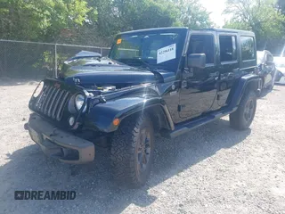 2016 Jeep Wrangler Unlimited Sahara with VIN 1C4BJWEG8GL253803, listed as a IAAI auction lot 42296118 with 163,463 mi miles and . Bid and sale history available at DreamBid. Image 2.
