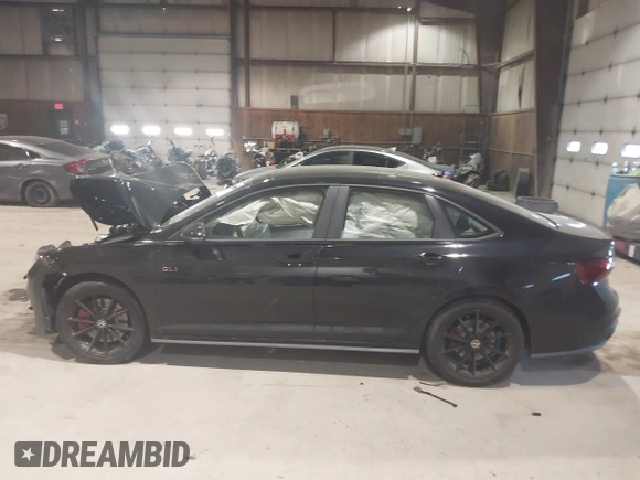 2025 Volkswagen Jetta GLI Autobahn z VIN 3VW2T7BU5SM021237, wystawiony jako IAAI lot #41271660 z przebiegiem 1092 mil mil oraz . Historia ofert i sprzedaży dostępna na DreamBid. Obrazek 15.