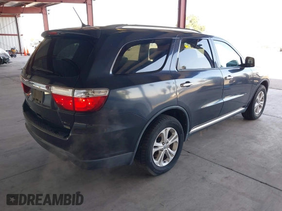 2013 Dodge Durango Crew with VIN 1C4RDHDG0DC616982, listed as a IAAI auction lot 42141275 with 178,752 mi miles. Bid and sale history available at carsss.com. Image 4.