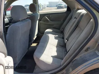 1998 Toyota Camry LE z VIN 4T1BG22K0WU352118, wystawiony jako IAAI lot #42066267 z przebiegiem 289 599 mil mil oraz . Historia ofert i sprzedaży dostępna na DreamBid. Obrazek 8.