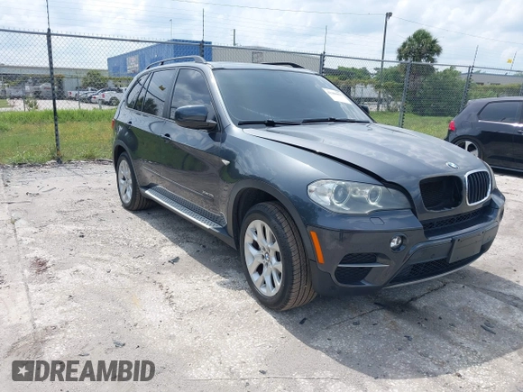 2012 BMW X5 35i z VIN 5UXZV4C5XCL990728, wystawiony jako IAAI lot #42386095 z przebiegiem 124 613 mil mil oraz . Historia ofert i sprzedaży dostępna na DreamBid. Obrazek 1.