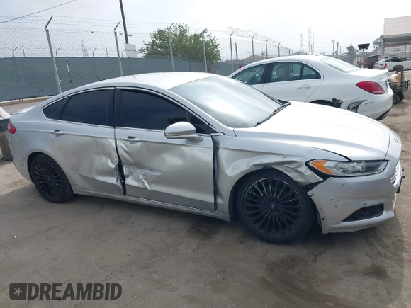 2016 Ford Fusion Titanium z VIN 3FA6P0K92GR135076, wystawiony jako IAAI lot #42604875 z przebiegiem 192 785 mil mil oraz . Historia ofert i sprzedaży dostępna na DreamBid. Obrazek 13.