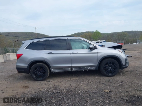 2021 Honda Pilot Special Edition with VIN 5FNYF6H20MB061334, listed as a IAAI auction lot 42123022 with 92,183 mi miles and . Bid and sale history available at DreamBid. Image 14.
