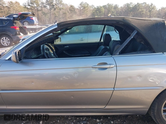 2004 BMW 3 Series 325Ci with VIN WBABW33404PL26897, listed as a IAAI auction lot 41007643 with 139,206 mi miles. Bid and sale history available at carsss.com. Image 14.
