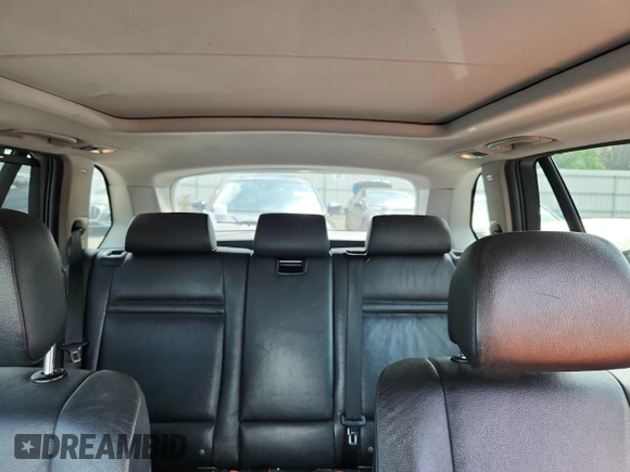 2012 BMW X5 35i with VIN 5UXZV4C5XCL765757, listed as a Copart auction lot 64497535 with 178,836 mi miles and Salvage title. Bid and sale history available at DreamBid. Image 10.