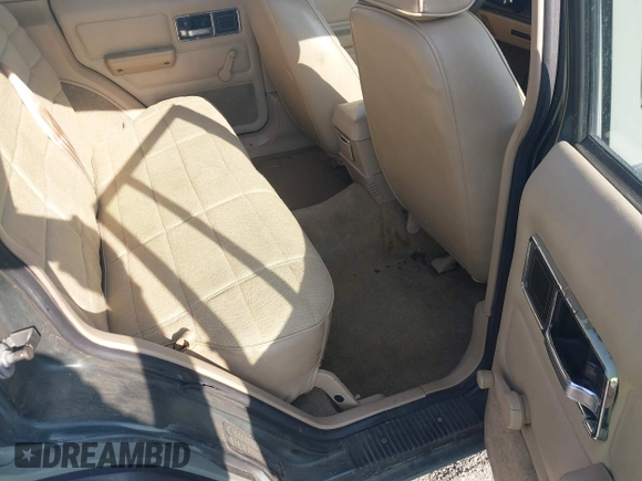 1992 Jeep Cherokee with VIN 1J4FT88S2NL251950, listed as a IAAI auction lot 42662079 with 1,689,263 mi miles and . Bid and sale history available at DreamBid. Image 8.