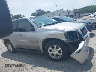 2004 GMC Envoy SLT with VIN 1GKDS13S742230325, listed as a IAAI auction lot 42385113 with 177,989 mi miles and . Bid and sale history available at DreamBid. Image 13.