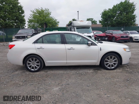 2012 Lincoln MKZ with VIN 3LNHL2GC7CR803331, listed as a IAAI auction lot 42321095 with 74,643 mi miles and . Bid and sale history available at DreamBid. Image 12.