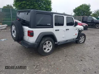 2021 Jeep Wrangler Unlimited Sport S with VIN 1C4HJXDG1MW850478, listed as a IAAI auction lot 42263715 with 31,284 mi miles and . Bid and sale history available at DreamBid. Image 4.