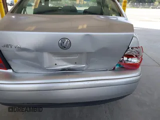 2000 Volkswagen Jetta GLS z VIN 3VWSA29M4YM195775, wystawiony jako IAAI lot #42131518 z przebiegiem 314 472 mil mil oraz . Historia ofert i sprzedaży dostępna na DreamBid. Obrazek 6.