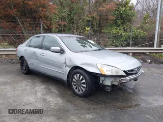 2003 Honda Accord LX with VIN 1HGCM56343A073355, listed as a IAAI auction lot 41872723 with 197,069 mi miles and . Bid and sale history available at DreamBid. Image 1.