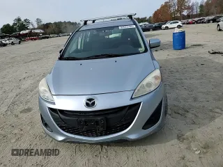 2012 Mazda 5 Sport с VIN JM1CW2BL2C0118957, выставлен на аукционе Copart как лот 82622764 с пробегом 107 691 миль миль и Списание • Salvage title. История ставок и продаж доступна на DreamBid. Изображение 11.