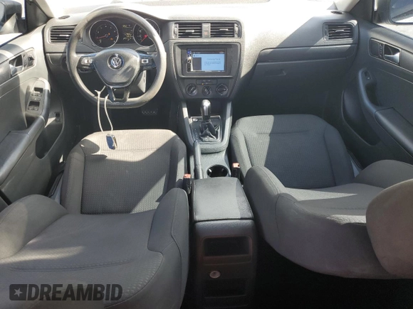 2015 Volkswagen Jetta S with VIN 3VW2K7AJ9FM323047, listed as a Copart auction lot 59098565 with 169,648 mi miles and Salvage title. Bid and sale history available at DreamBid. Image 8.