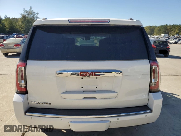2019 GMC Yukon Denali with VIN 1GKS2CKJ1KR310963, listed as a Copart auction lot 75862254 with 102,602 mi miles and Salvage Title. Bid and sale history available at carsss.com. Image 6.