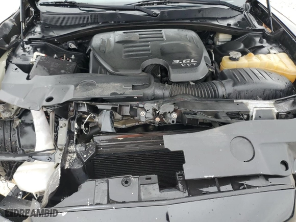 2012 Dodge Charger SXT with VIN 2C3CDXHG2CH282299, listed as a Copart auction lot 83696994 with 115,913 mi miles and Salvage Title. Bid and sale history available at carsss.com. Image 11.