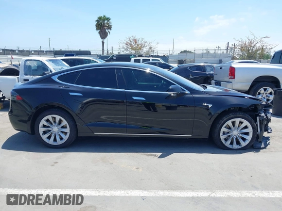2017 Tesla Model S 60 with VIN 5YJSA1E17HF232699, listed as a IAAI auction lot 42327539 with 113,923 mi miles and . Bid and sale history available at DreamBid. Image 14.