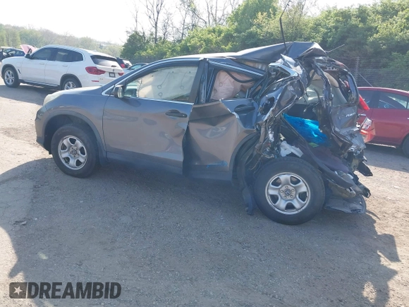 2015 Honda CR-V LX with VIN 5J6RM4H30FL021398, listed as a IAAI auction lot 42109029 with 80,448 mi miles and . Bid and sale history available at DreamBid. Image 3.
