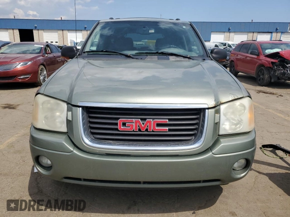 2003 GMC Envoy SLT with VIN 1GKDT13S032112192, listed as a Copart auction lot 54351985 with 297,007 mi miles and Clean Title. Bid and sale history available at carsss.com. Image 5.