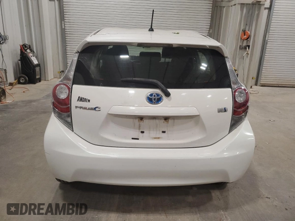 2014 Toyota Prius One z VIN JTDKDTB33E1558853, wystawiony jako Copart lot #57339425 z przebiegiem Nie podano mil oraz Nie do naprawy • Non repairable. Historia ofert i sprzedaży dostępna na DreamBid. Obrazek 6.
