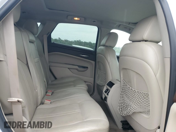 2013 Cadillac SRX Performance Collection with VIN 3GYFNHE33DS602428, listed as a Copart auction lot 55688555 with 143,504 mi miles and Salvage title. Bid and sale history available at DreamBid. Image 11.