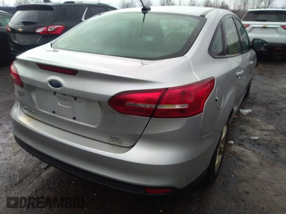2017 Ford Focus SE with VIN 1FADP3FE0HL297434, listed as a IAAI auction lot 41112937 with 139,889 mi miles and . Bid and sale history available at DreamBid. Image 4.