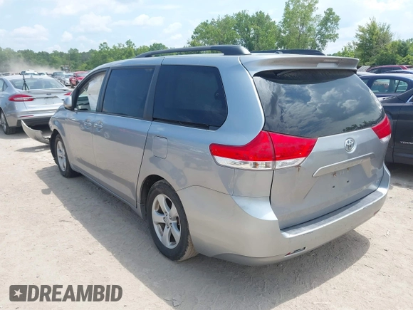 2011 Toyota Sienna LE AAS with VIN 5TDKK3DCXBS156328, listed as a IAAI auction lot 42721542 with 153,286 mi miles and . Bid and sale history available at DreamBid. Image 3.