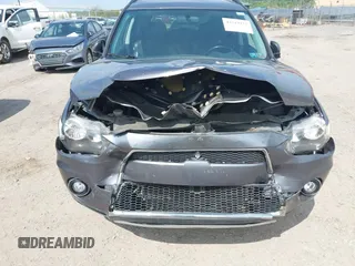 2010 Mitsubishi Outlander z VIN JA4AT3AW9AZ016348, wystawiony jako IAAI lot #42219377 z przebiegiem 104 414 mil mil oraz . Historia ofert i sprzedaży dostępna na DreamBid. Obrazek 6.