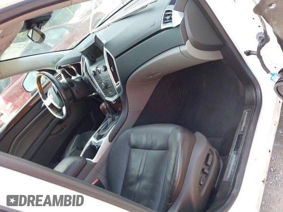 2010 Cadillac SRX Premium Collection with VIN 3GYFNFEY2AS528611, listed as a IAAI auction lot 42770194 with 213,366 mi miles and . Bid and sale history available at DreamBid. Image 5.