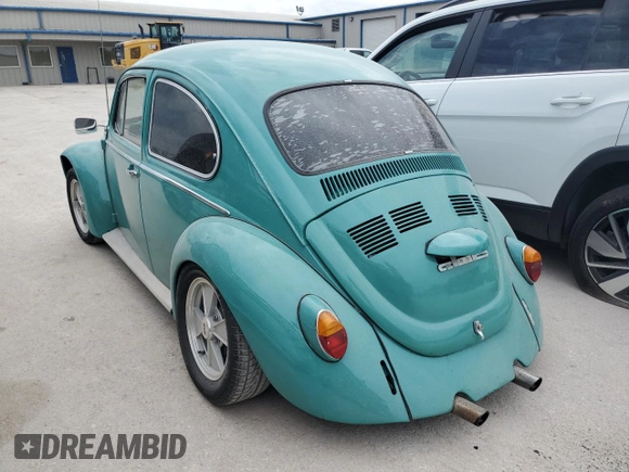 1969 Volkswagen Beetle with VIN 119682637V, listed as a Copart auction lot 70315404 with 59,148 mi miles and Salvage Title. Bid and sale history available at DreamBid. Image 2.