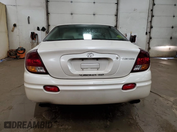 2003 Oldsmobile Aurora z VIN 1G3GS64C534171677, wystawiony jako Copart lot #74768254 z przebiegiem 113 932 mil mil oraz Tytuł czysty. Historia ofert i sprzedaży dostępna na DreamBid. Obrazek 6.