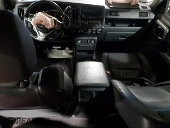 2010 Honda Ridgeline RTL with VIN 5FPYK1F5XAB011944, listed as a Copart auction lot 52434175 with 137,585 mi miles and Salvage title. Bid and sale history available at DreamBid. Image 8.