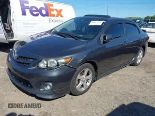 2011 Toyota Corolla L with VIN 2T1BU4EE2BC684289, listed as a IAAI auction lot 42027474 with 214,657 mi miles. Bid and sale history available at carsss.com. Image 2.