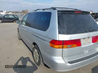 2004 Honda Odyssey EX-L with VIN 5FNRL18964B125664, listed as a IAAI auction lot 41531606 with 327,493 mi miles and . Bid and sale history available at DreamBid. Image 3.